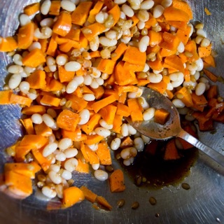 carrot, navy bean, and wheat berry salad with soy sauce vinaigrette